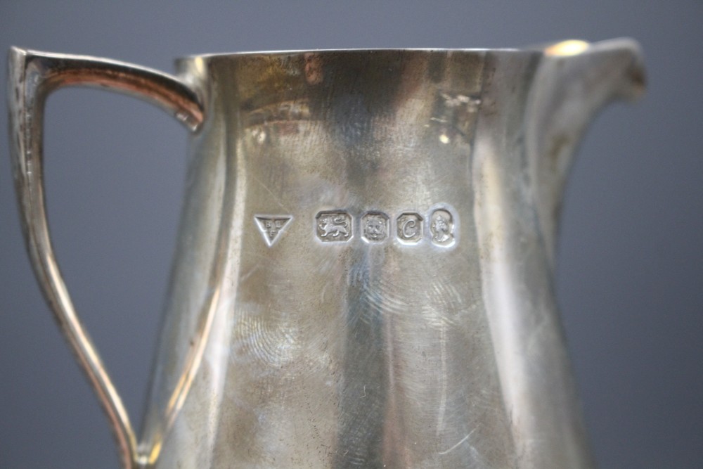 A 1970s silver cream jug by Brian Leslie Fuller, London, 1977, height 92mm, 5.5 oz.